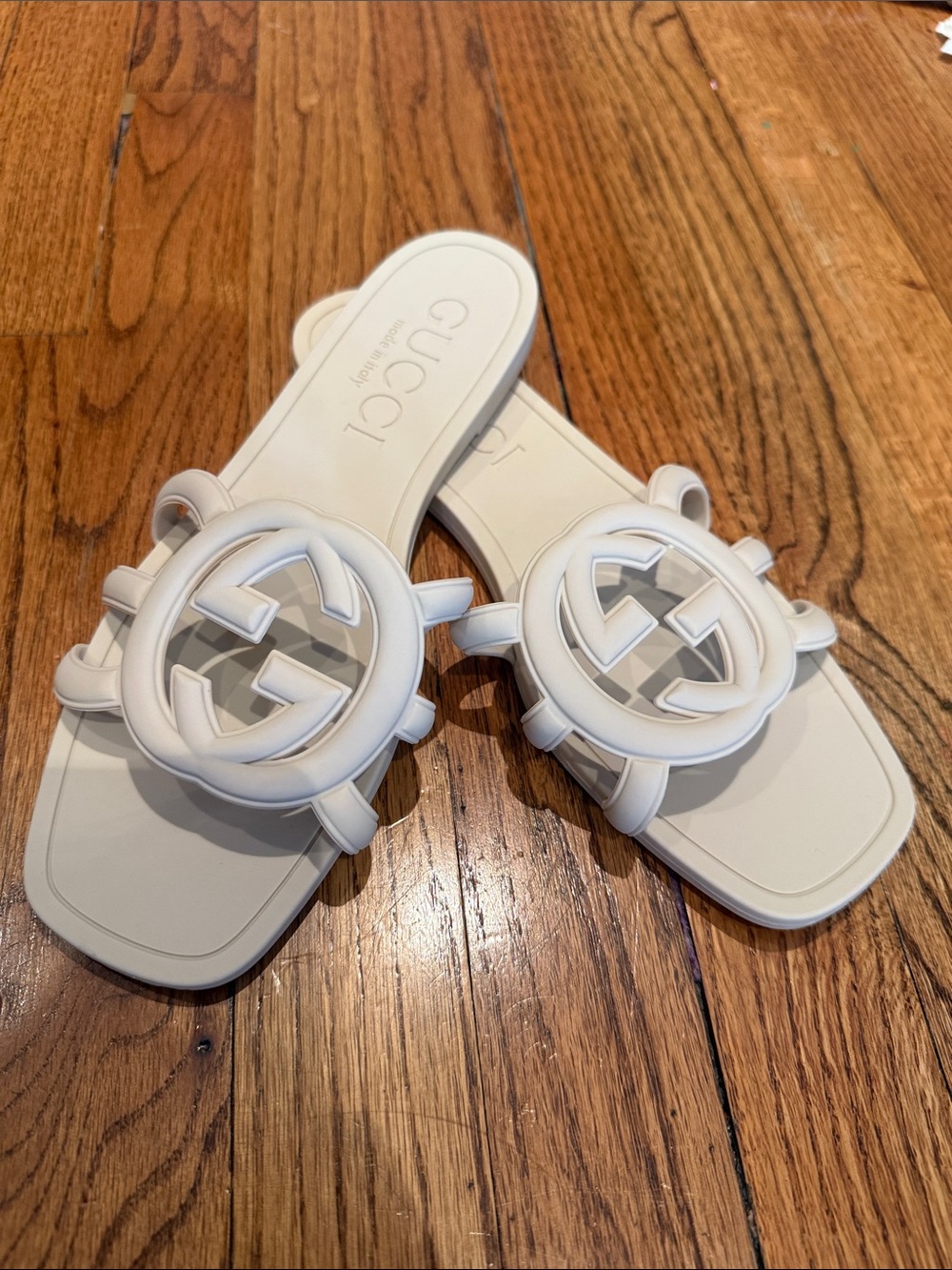Gucci women’s off white Interlocking G Slide Sandals
